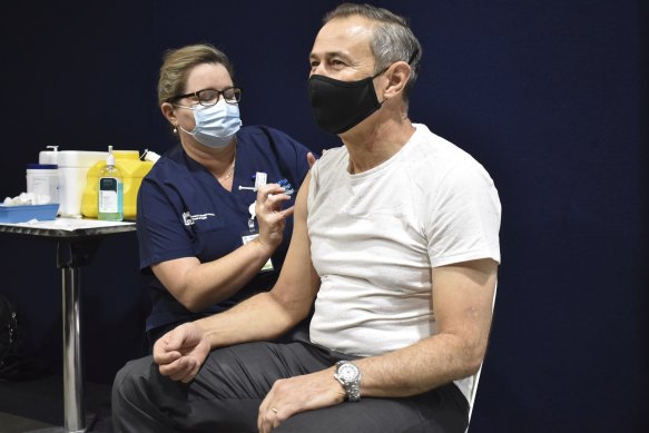 WA Health Minister Roger Cook being vaccinated. 