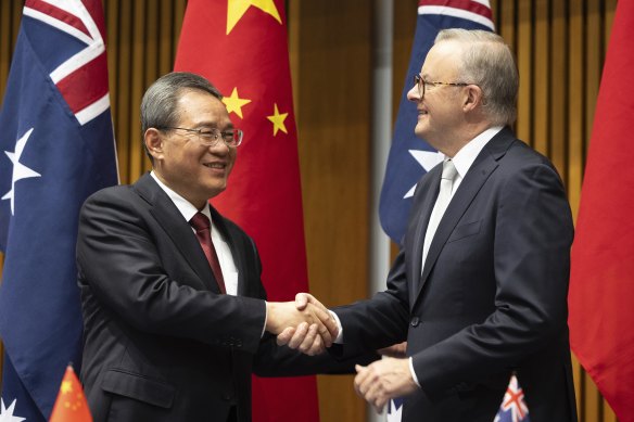 China’s Premier Li Qiang with Prime Minister Anthony Albanese in Canberra yesterday.