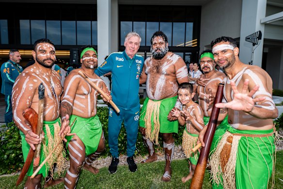 Brazil coach Carlo Ancelotti and representatives from Wulgurukaba Walkabouts, who performed a smoking ceremony to welcome the team to Townsville.
