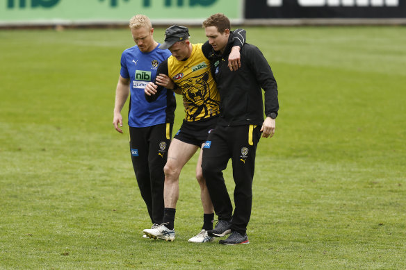 Noah Cumberland is helped off the training track at Richmond.