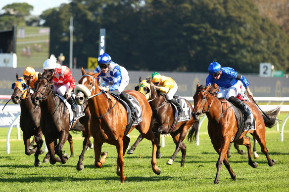 Autumn Angel hits the front in the Australian Oaks.