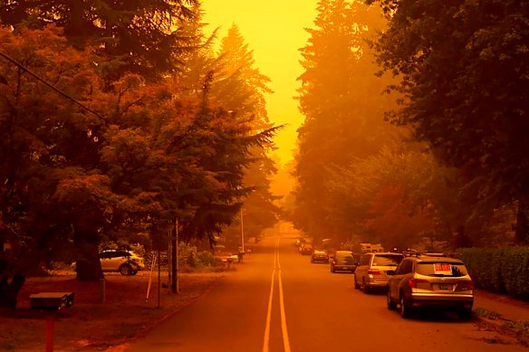 A street in West Linn, Oregon, is shrouded in smoke from wildfires.