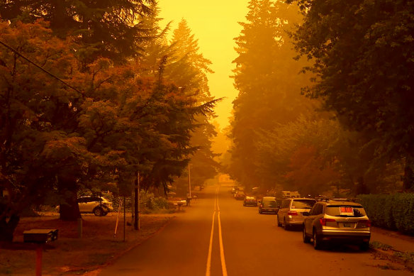 A street in West Linn, Oregon, is shrouded in smoke from wildfires.