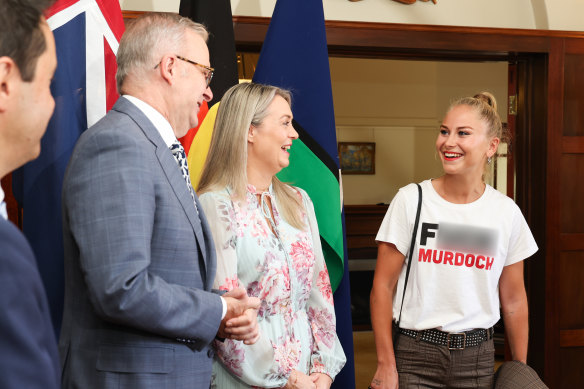 Former Australian of the Year Grace Tame wore the t-shirt at The Lodge.