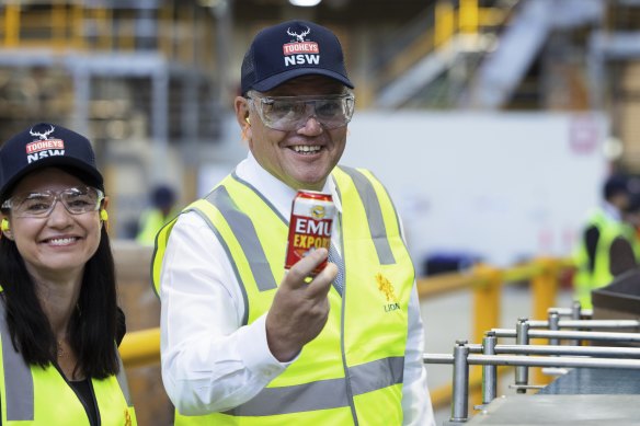 Then-prime minister Scott Morrison campaigning in the seat of Reid, which received 20 times more in grant funding than the adjacent seat of Grayndler, held by Labor leader Anthony Albanese.