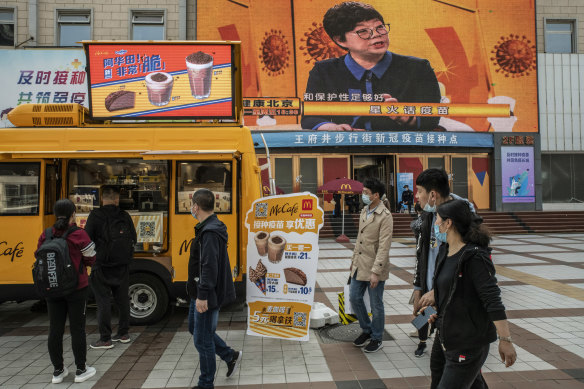 A McDonald’s ice cream truck outside a vaccination centre in Beijing on Tuesday, offers a two-for-one promotion for those getting a COVID-19 vaccine.