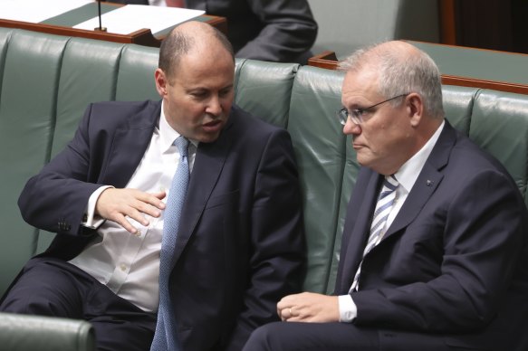 Treasurer Josh Frydenberg and Prime Minister Scott Morrison in the House of Representatives. 