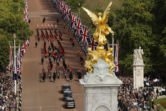 The procession makes its way from Buckingham Palace to Westminster Hall.