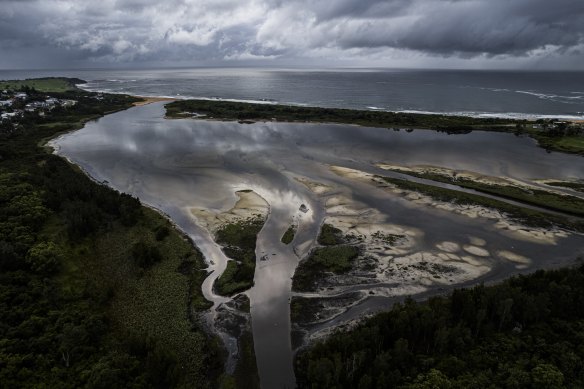 The Dee Why Lagoon runs out to sea after constant heavy rain.