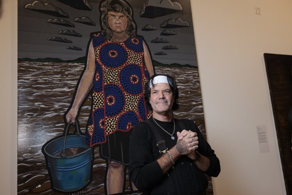 Blak Douglas with his Archibald Prize-winning portrait Moby Dickens.