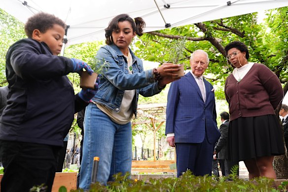 King Charles visits urban farming program Harlem Grown.