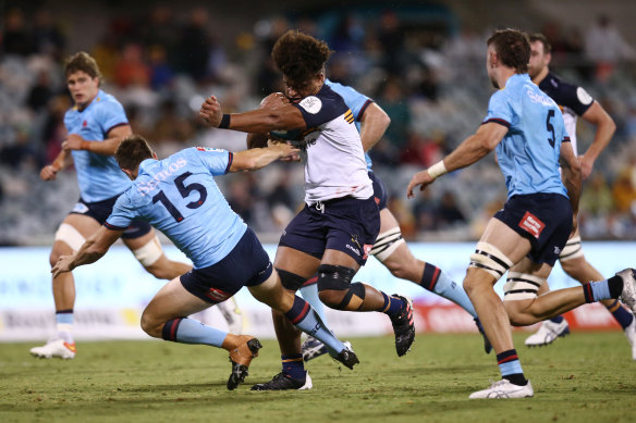 Rob Valetini makes a powerful charge for the Brumbies against NSW.