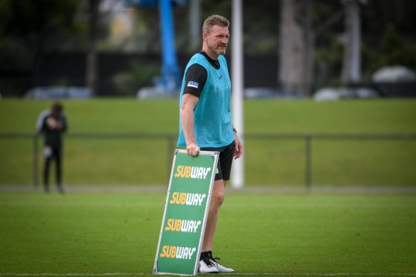 Nathan Buckley oversees Collingwood training on Monday.