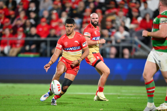 Isaiya Katoa puts a kick through for the Dolphins against the Rabbitohs.