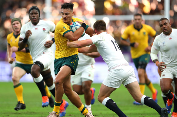Jordy Petaia carries the ball against England in the 2019 Rugby World Cup.