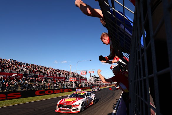 Brodie Kostecki crosses the finish line in his Ford Mustang to win the Bathurst 1000.