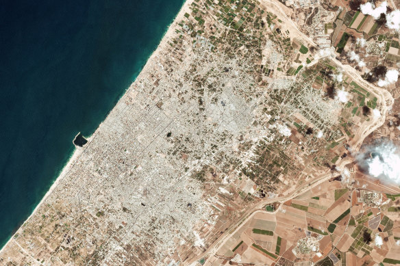 This satellite photo released by Planet Labs shows the damage on the Gaza Strip on Thursday.