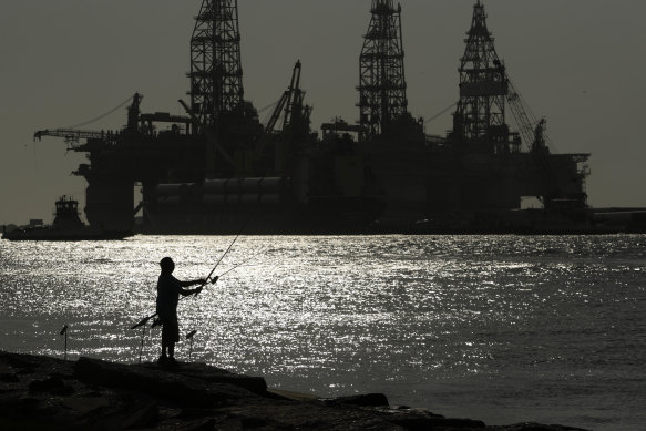 Docked oil drilling platforms in Port Aransas, Texas. 