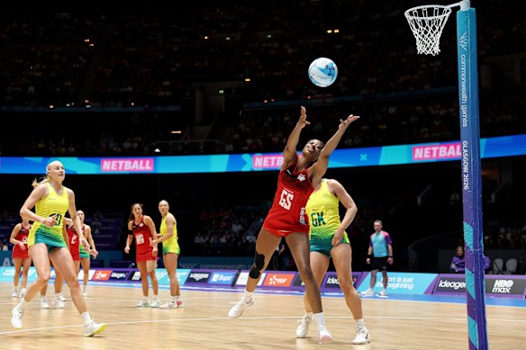 Olivia Tchine of Team England jumps for the ball in the bronze medal match.