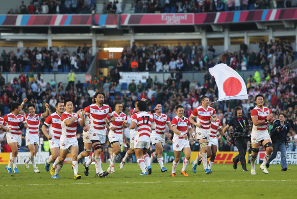 Japan celebrating in 2015 after beating the Springboks.