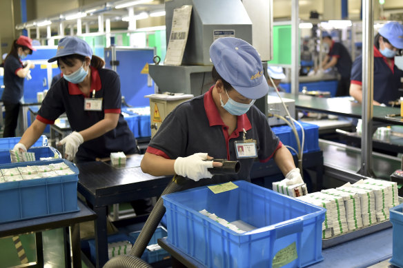 Workers assembling lithium batteries at a factory in China’s Zhejiang province.