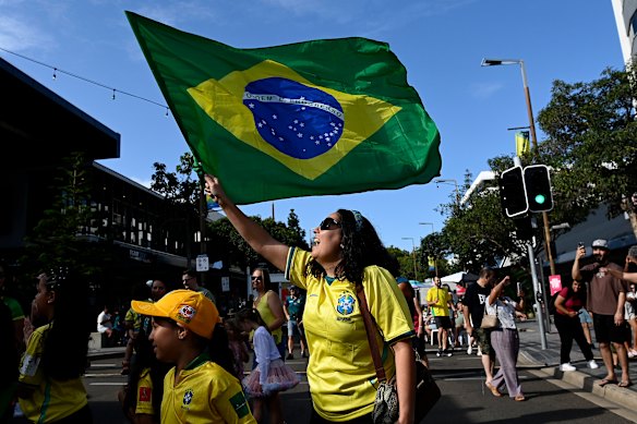 Brazilian fans show their support before the start of the match between the Socceroos and Brazil at Queensland Country Bank Stadium.