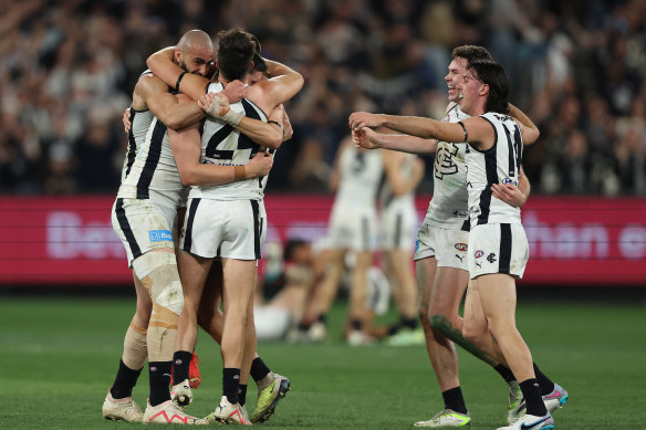 The Blues celebrate the win.