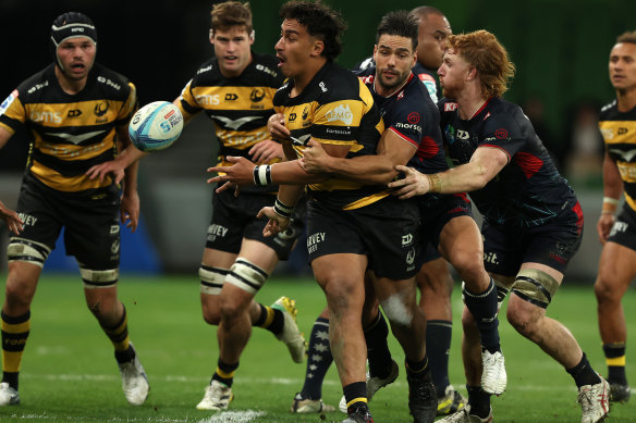 Marley Pearce of the Western Force passes during his team’s loss to the Melbourne Rebels at AAMI Park.