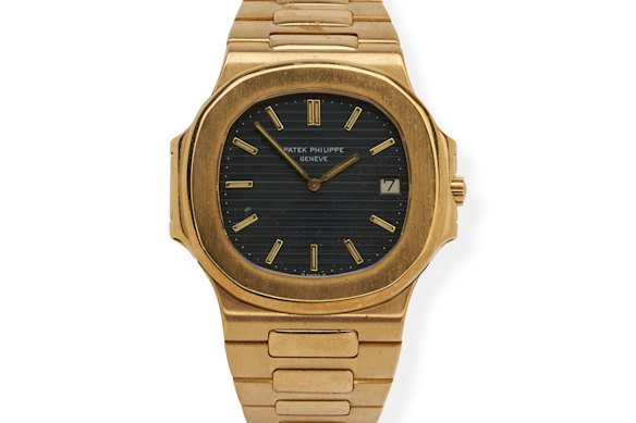 This Patek Philippe Nautilus “Jumbo” yellow gold bracelet watch sold for $213,000.