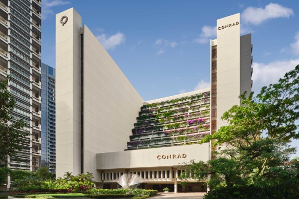 The Conrad Singapore Orchard, with its Escherian interior and eye-popper triangular facade, opened as the Pavilion InterContinental Hotel in 1982.