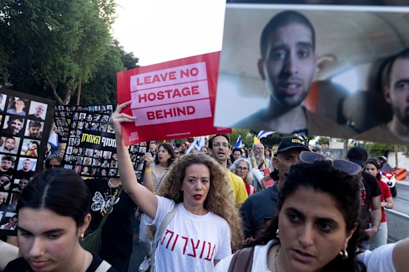 Demonstrators in Tel Aviv, Israel, hold photos of hostages held in the Gaza Strip during a protest on the 600th day since the October 7 attack, on Wednesday. It is believed Hamas still holds more than 50 hostages.