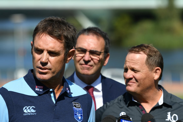 Freddy Fittler helps launch Origin I in Adelaide last month with Queensland counterpart Kevin Walters and SA Premier Steven Marshall.
