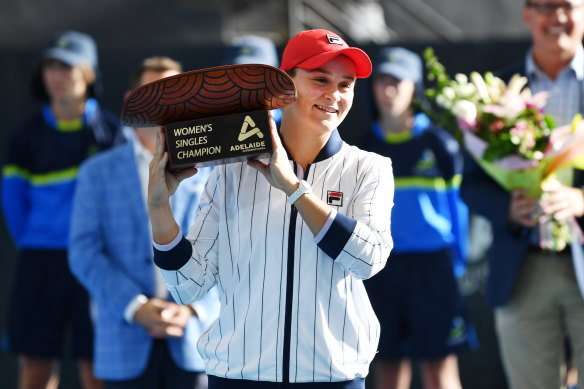 Ashleigh Barty lifts the trophy after winning the Adelaide International women's final on Saturday.