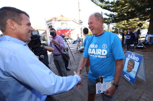 Mike greeting his father, Bruce, on NSW state election day in 2015.