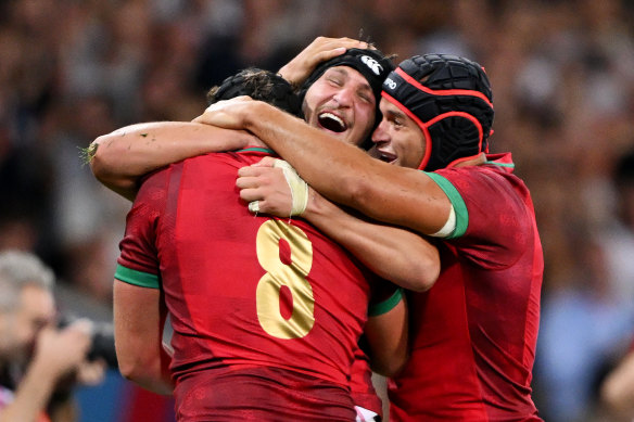 Portugal celebrate after their maiden World Cup win.