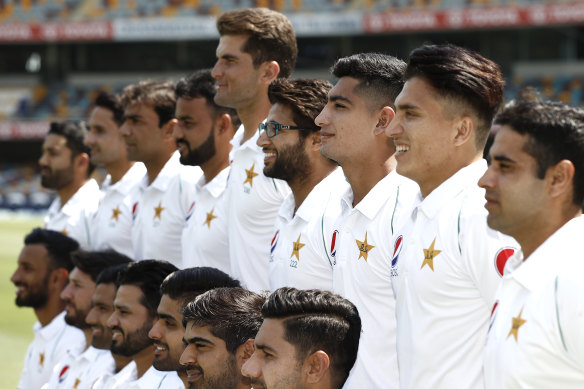 The Pakistan team pose for a photo at the Gabba ahead of the first Test.