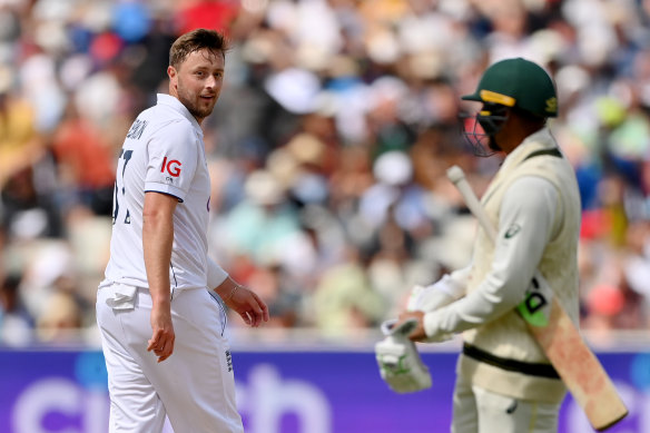 Ollie Robinson exchanges words with Usman Khawaja on the final day of the first Test.