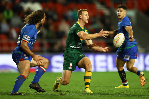 Daly Cherry-Evans passes for Australia against Italy.