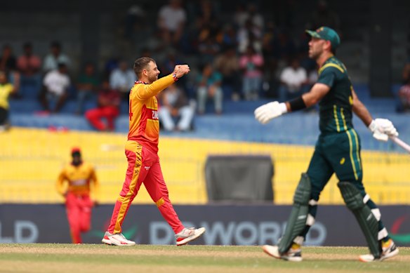 Ryan Burl of Zimbabwe celebrates the wicket of Glenn Maxwell of Australia.