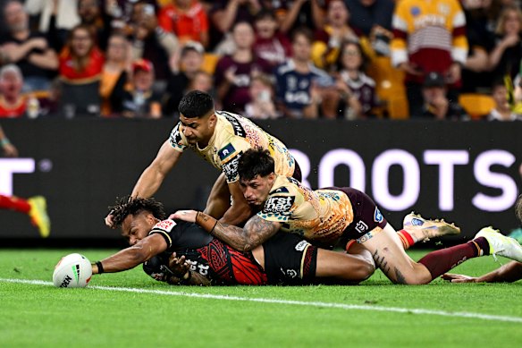 Hamiso Tabuai-Fidow scores against Brisbane.