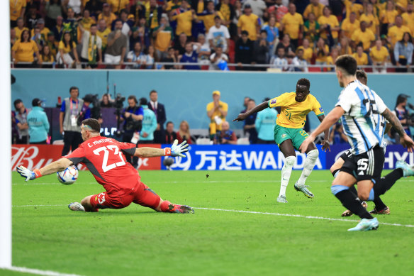 Garang Kuol is denied by Argentina goalkeeper Emiliano Martinez at the World Cup in 2022.