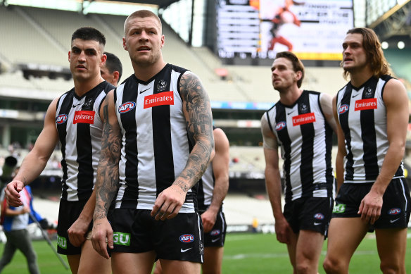 The Pies leave the field after their loss to Gold Coast in round seven.
