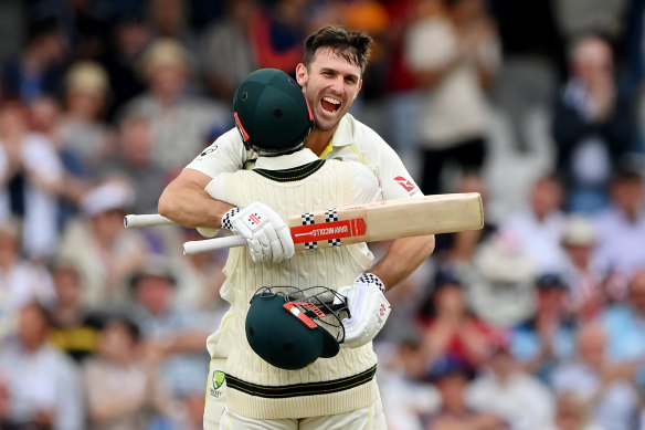 Mitchell Marsh celebrates with Travis Head after reaching his century on day one of the third Ashes Test at Headingley.