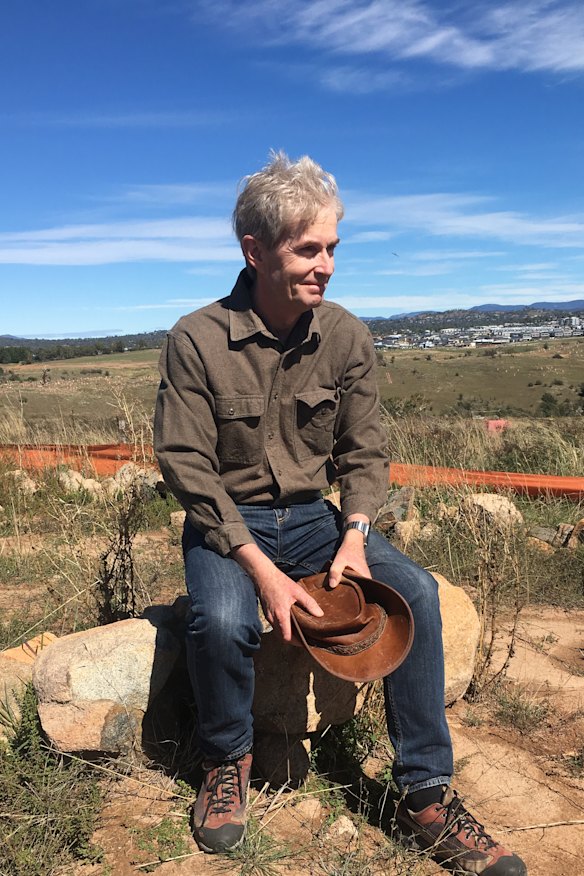 Craig Collins of Coombs sits in the ‘belly’ of the giant roo in the Molonglo River Reserve.