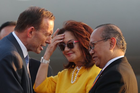 Nadjib Riphat Kesoema (right) welcomes Tony Abbott to Bali in 2013.