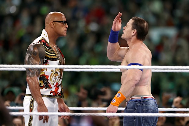 PHILADELPHIA, PENNSYLVANIA - APRIL 07: Dwayne “The Rock” Johnson and John Cena fight during Night Two at Lincoln Financial Field on April 07, 2024 in Philadelphia, Pennsylvania.  (Photo by Tim Nwachukwu/Getty Images)