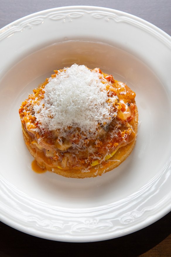 Arepa de Alambre with capsicum, mushrooms, parmesan and confit garlic.