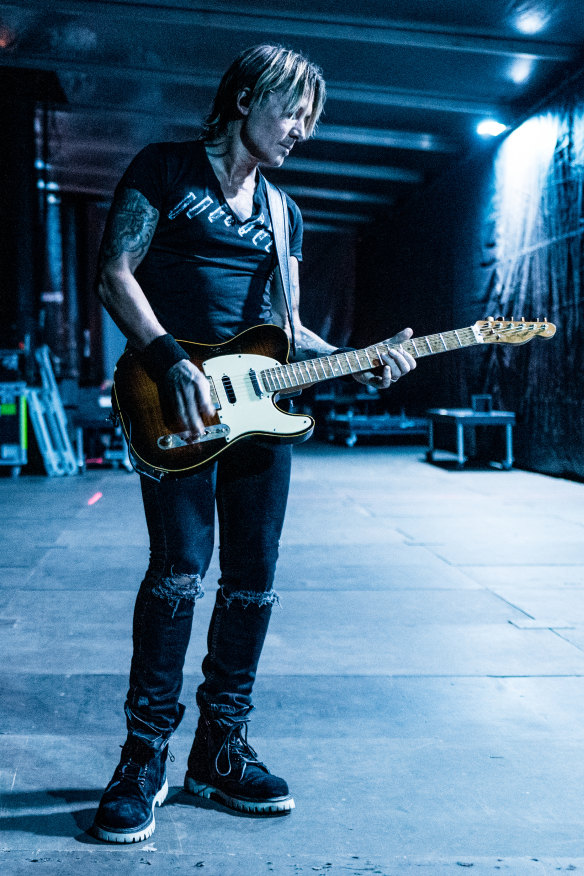 Keith Urban backstage during a festival in Nashville, Tennessee, last year. He says his songs always have their roots in real people: “I’m not creating something completely fictional.”