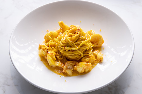 Spaghettini, with the golden glow of saffron, and prawns.