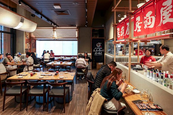 The space seats 150, with a bar for solo diners and booths for groups.